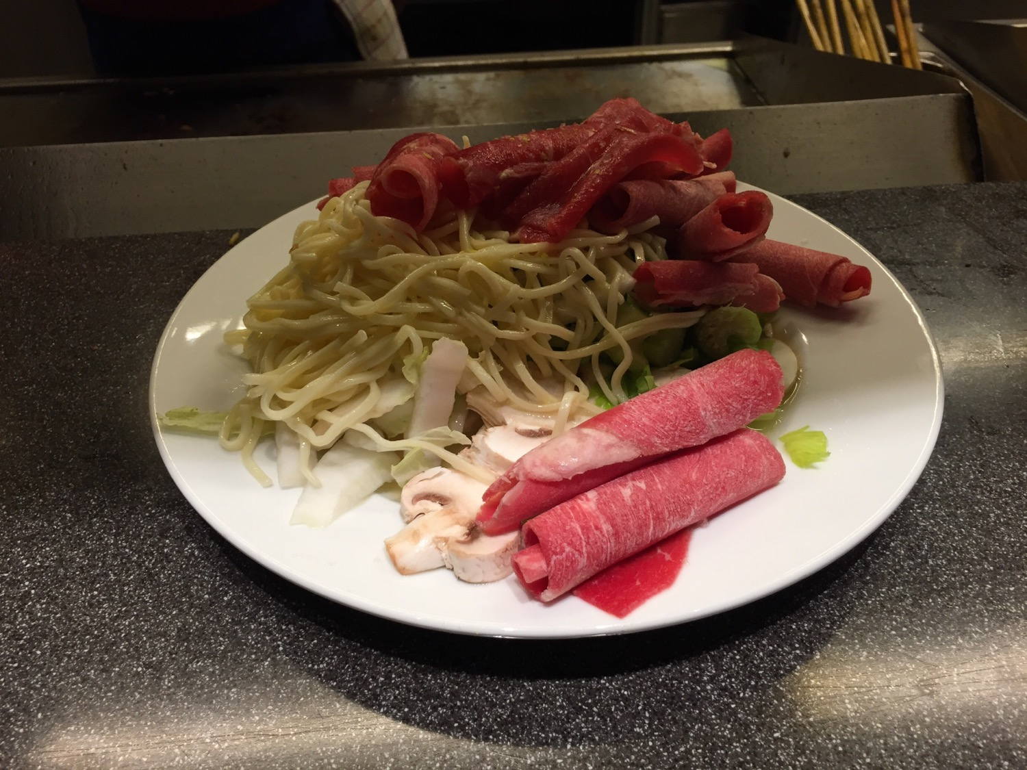 Hungry - eating at the Mongolian Barbecue.
