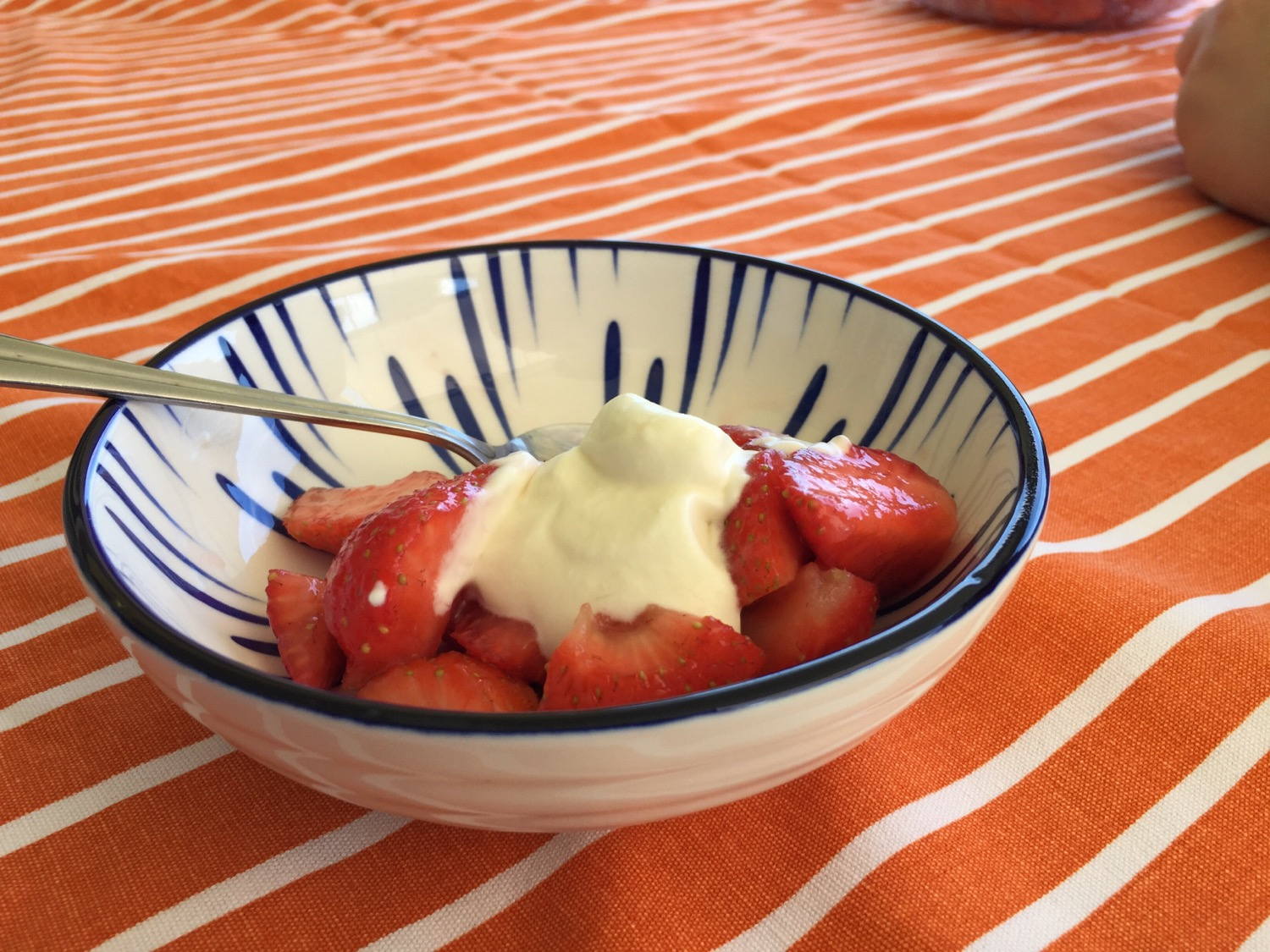 Strawberries with whipped cream.
