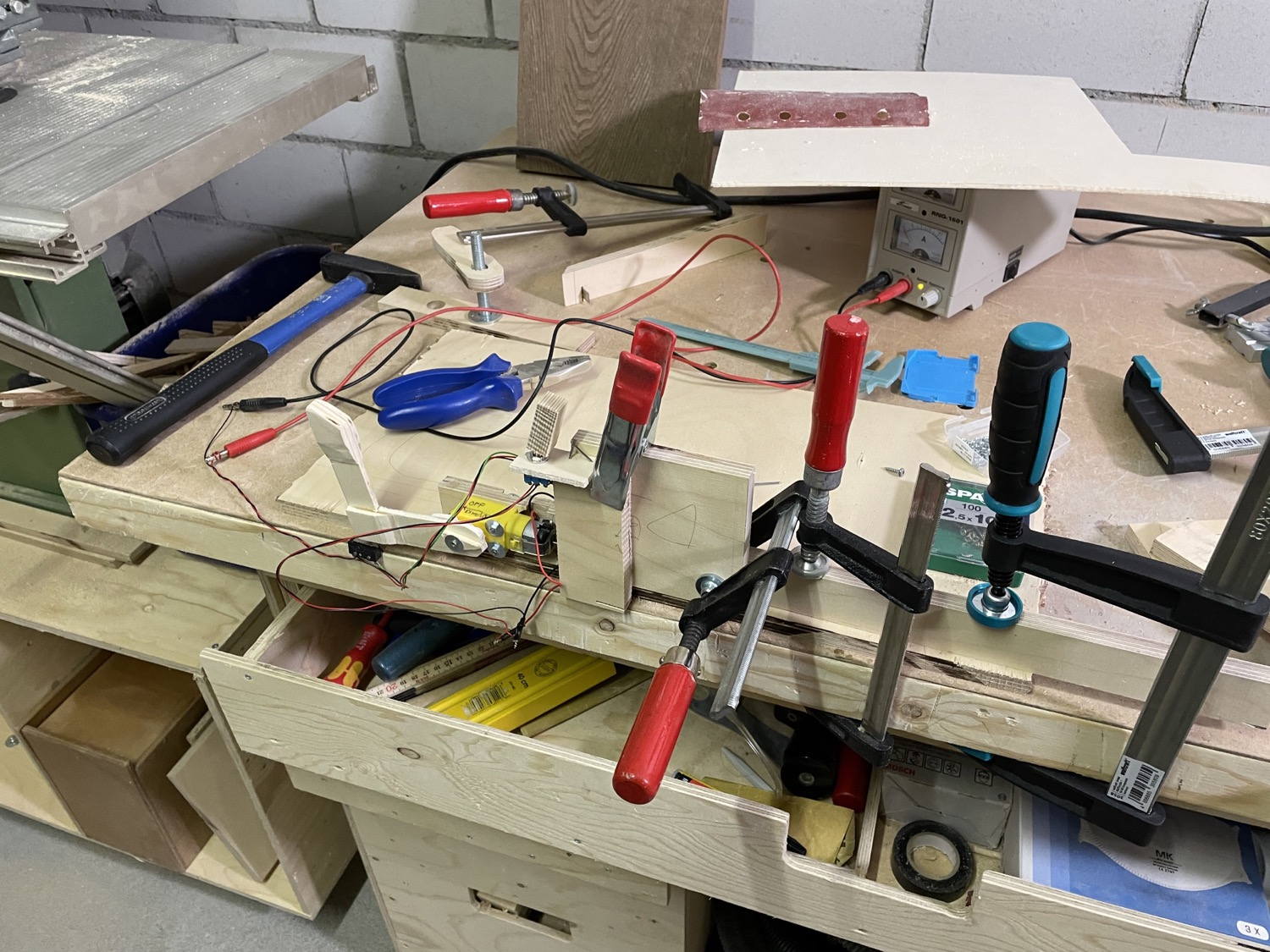 I am working on a useless box. The prototype is working.
