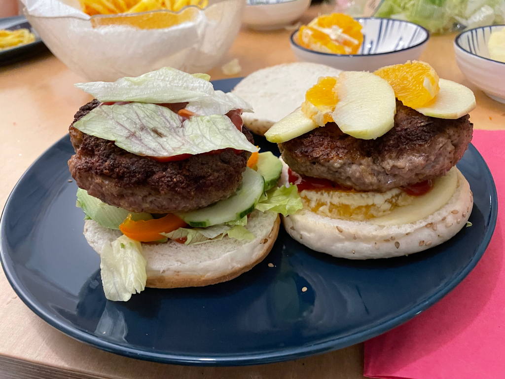 Left: Avocado, cucumber burger; right side: apple and orange burger. These were tasty.
