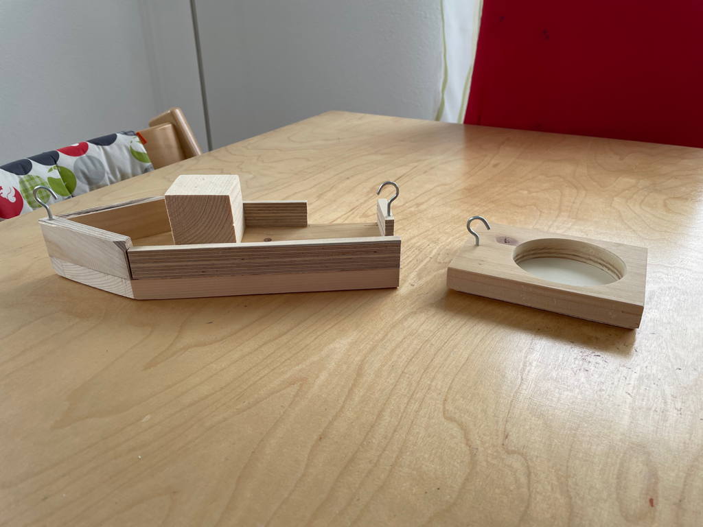 Another woodworking project by my daughter. A small boat with a tender.
