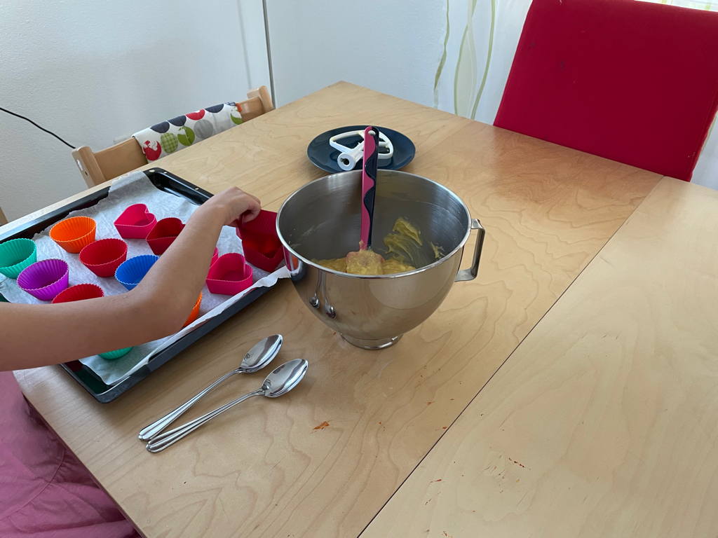 I am baking with my daughter.
