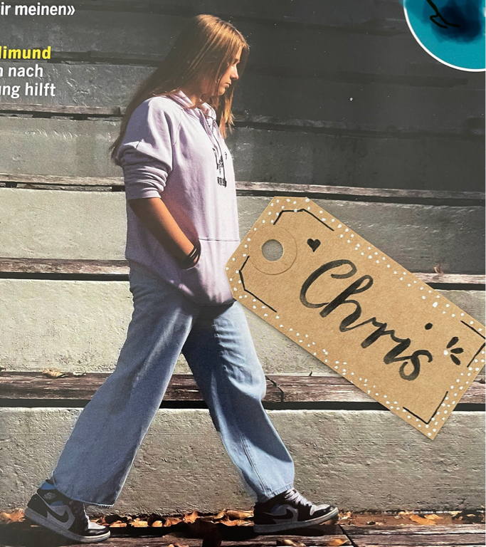 A name tag has fallen on a random magazine cover. Somehow the result speaks to me.
