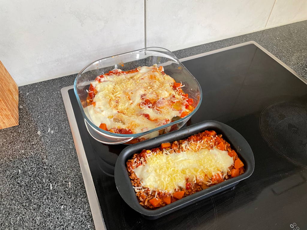 Two of the four lasagnas created for dinner today. The one in the back is vegetarian.
