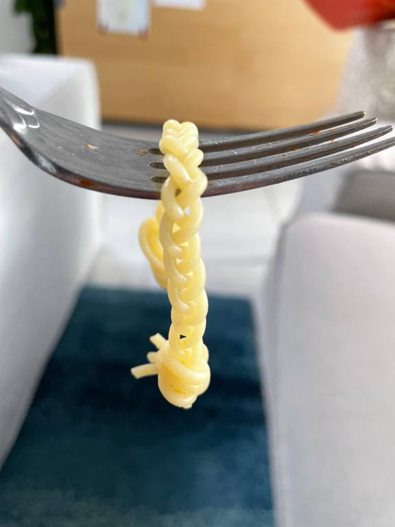 Like father like daughter. Braided spaghetti from our lunch today.
