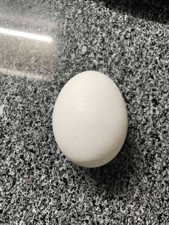 Photo Challenge Day 7 A whole egg. Soon it will be broken.
