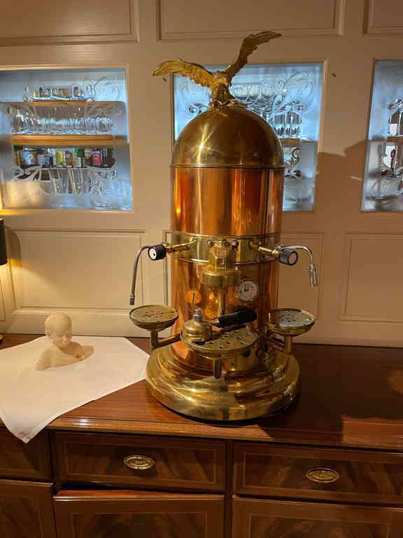 Photo Challenge Day 11 Not sure if this is gimcrack or steampunk. The coffee machine in I was eating dinner yesterday evening. But one thing is for sure: It was undoubtedly costly.
