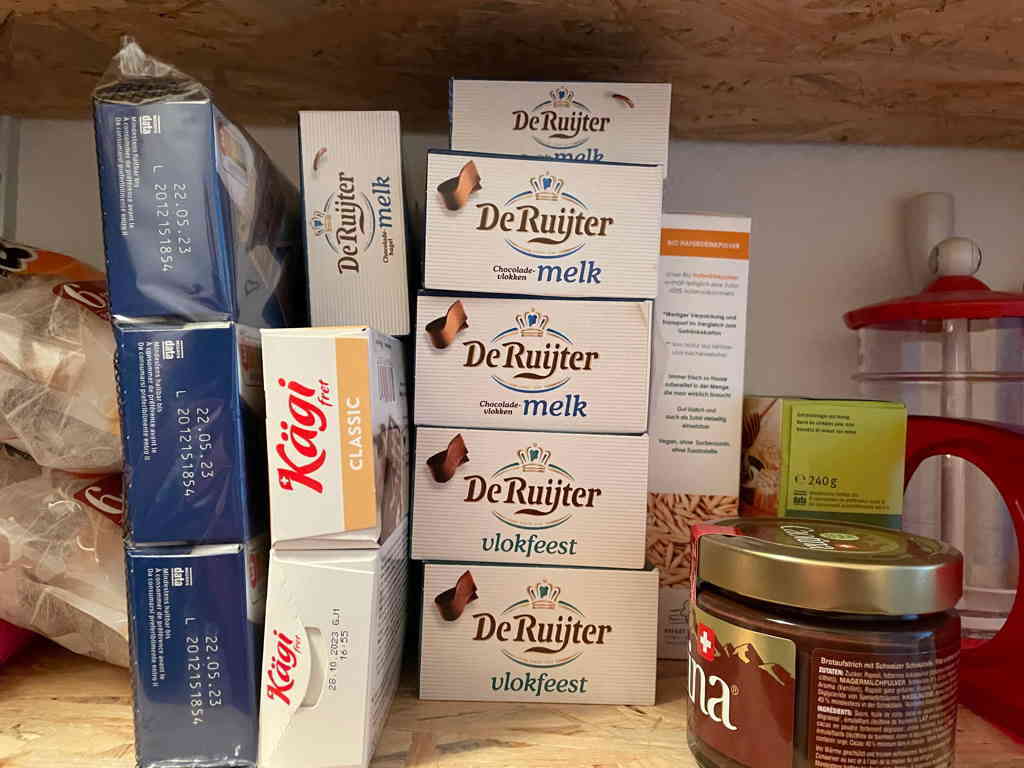 Photo Challenge Day 27 Part of my support to start and survive the day: Six packings of Hagelslag and multiple other assorted cookies from our pantry.
