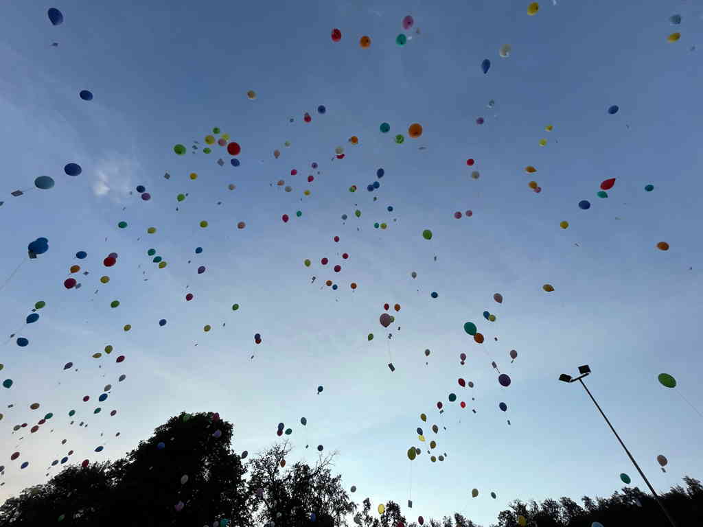 Picture towards the sky showing hundreds of gallons just released.