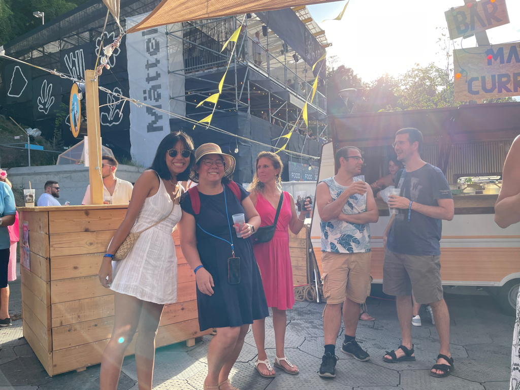 Group image of five humans posing for the photo. 