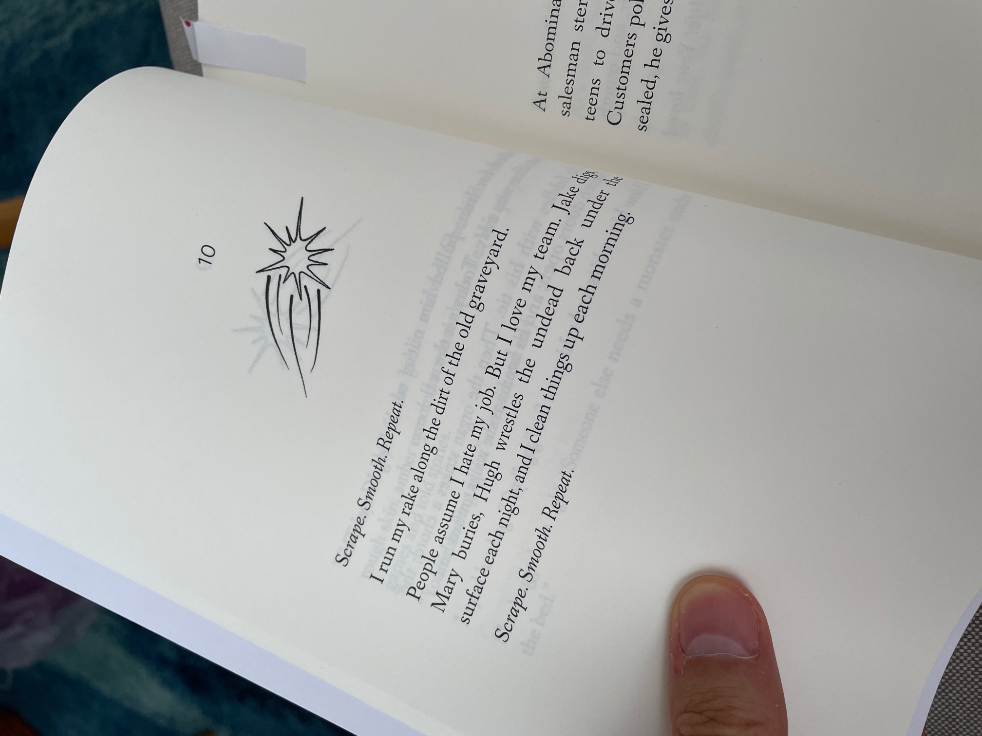 An example of one of the short stories. The text reads 'Scrape. Smooth. Repeat. I run my rake along the dirt of the old graveyard. People assume I hate my job. But I love my team. Jake diggs. Marry burries, Hugh wrestles the undead back the surface each night, and I clean things up each morning. Scrape. Smooth. Repeat.'