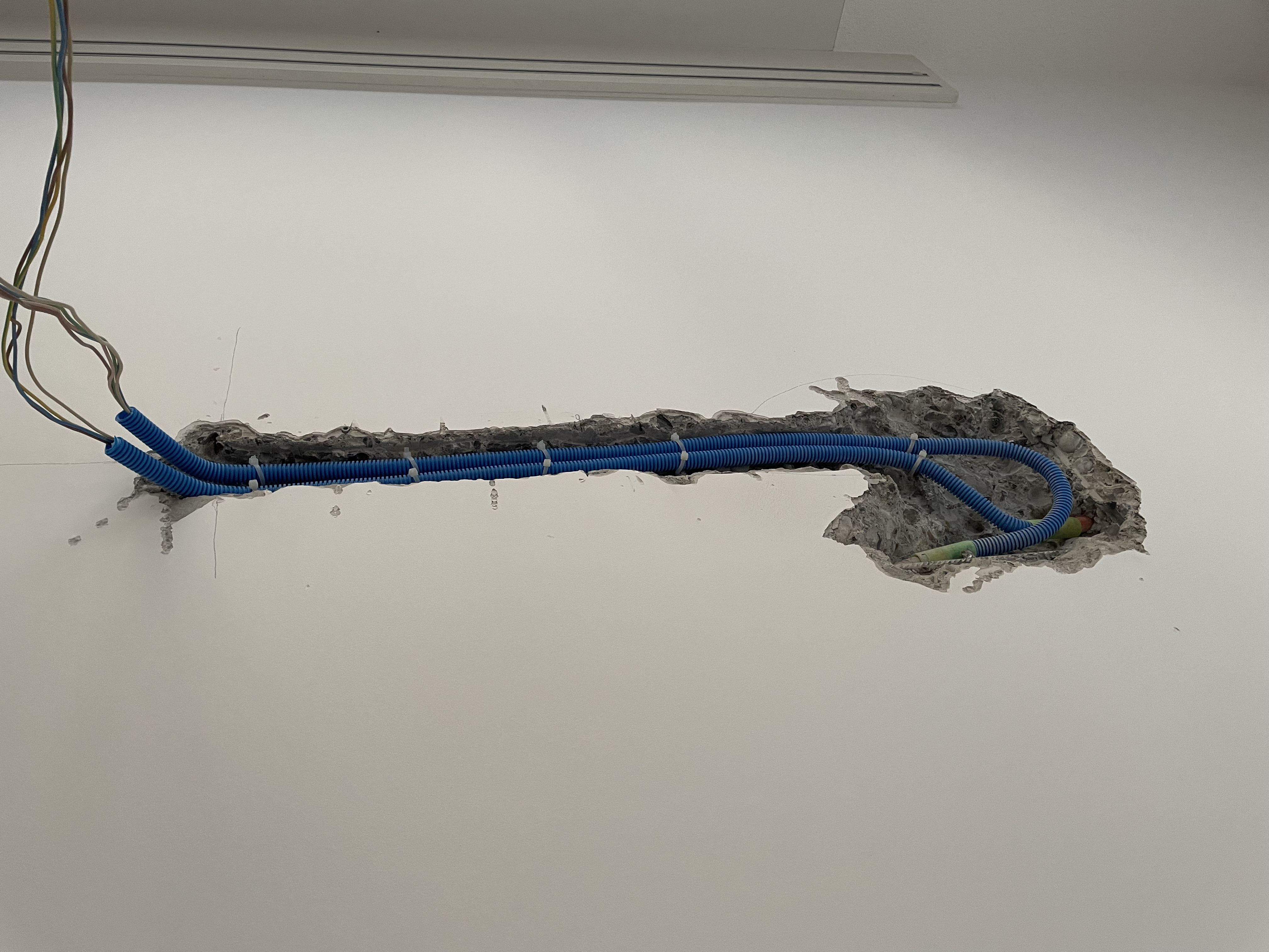 The hole in the ceiling with the installed pipes for our ceiling lamp. This was the trigger for this writing.