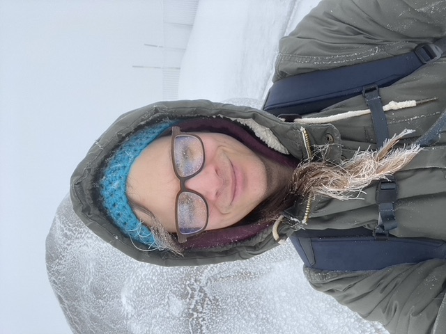 Selfie of my on the top of the mountain in snow and fog.