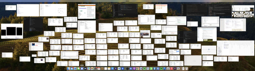 A screenshot of my desctop with the Expose function enabled. It shows at least 100 windows. On my ultrawide monitor.