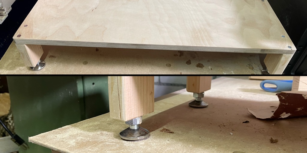The image shows two views of a wooden platform on adjustable metal feet. The top half of the image displays the platform from above, highlighting the light-colored wood and the metal feet at the corners. The bottom half provides a closer view of two of the legs, showing them mounted on a wooden surface. The adjustable feet have metal bases, and various tools and materials are partially visible in the background.