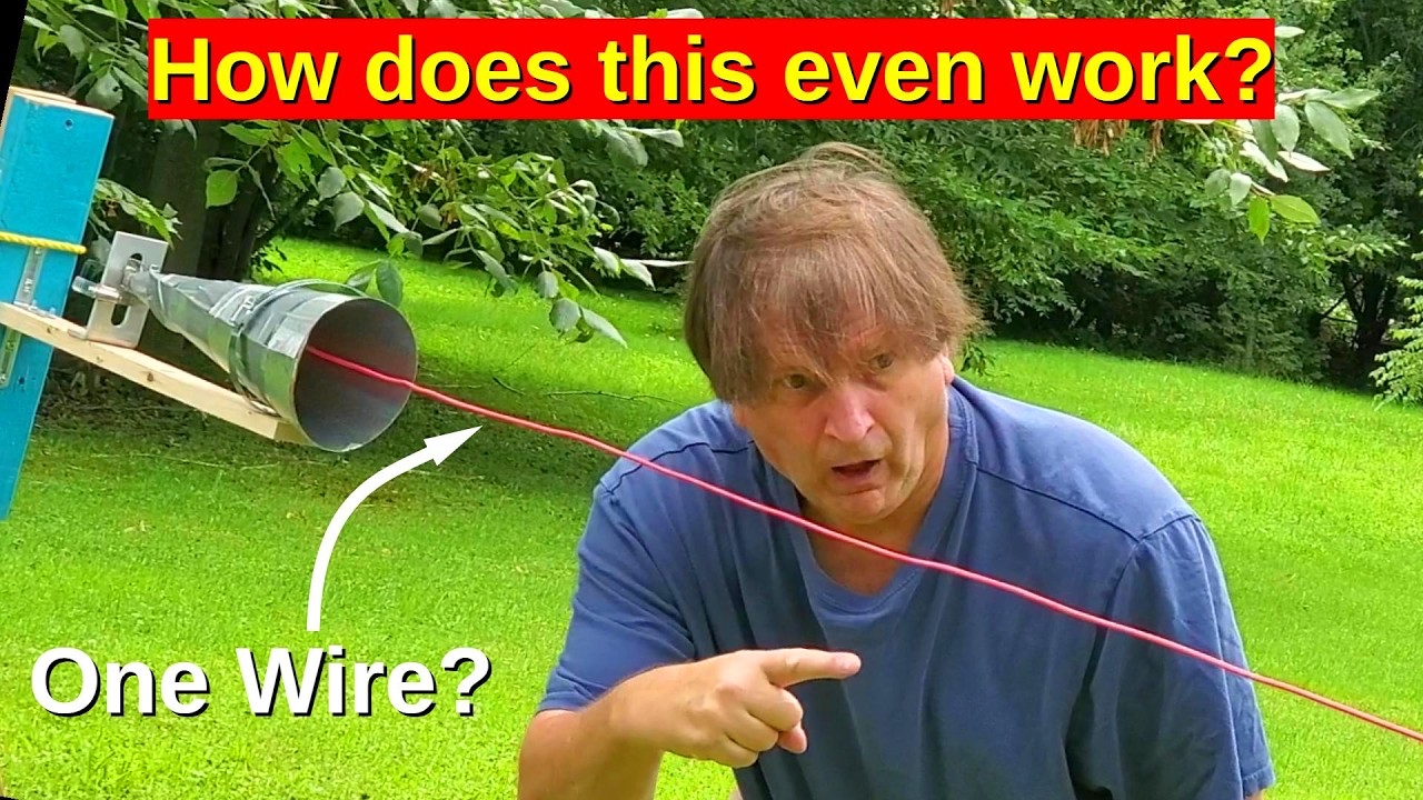 The YouTube video thumbnail features a person in a blue shirt outdoors, pointing at a setup involving a red wire spanning across the image. A metal funnel-like object is attached to a wooden support on the left. The background shows green grass and trees. Bold text at the top reads “How does this even work?” in red, while an arrow points to the wire with the words “One Wire?” in white.