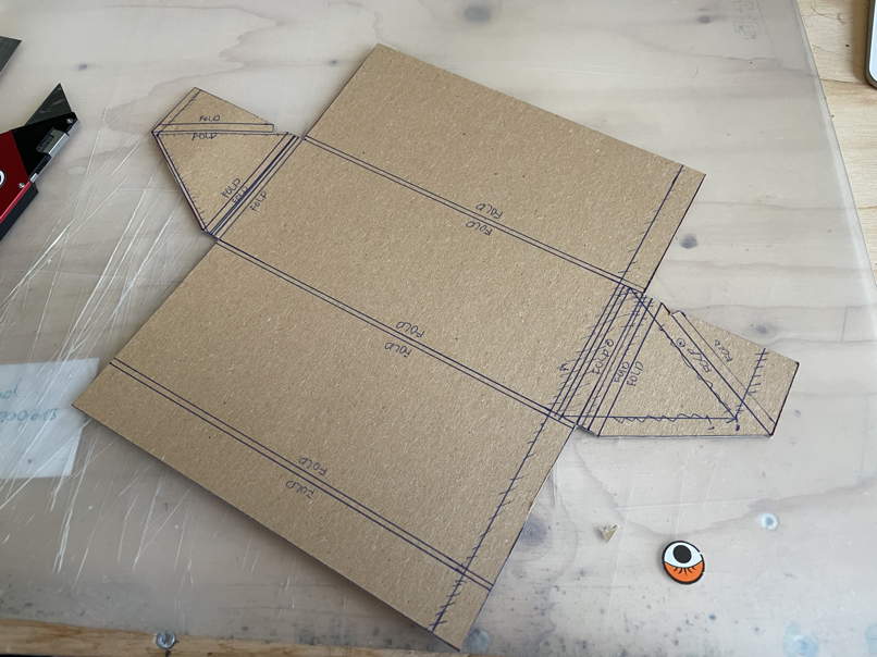 The cutout cardboard stock.